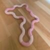 Boucle sensory toy Casulo Sensory held in hand